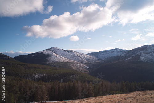 Bild auf Leinwand Natural earthly beauty with a snowy mountain in an open valley