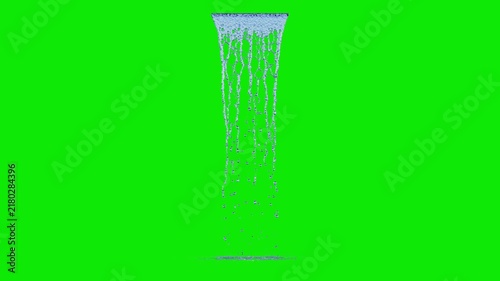 Front view of Dripping Water with a Small Flow from a short linear source to the ground on a perfect green background