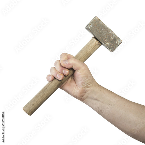 Foto A hand grips the wooden handle of a rusty sledgehammer