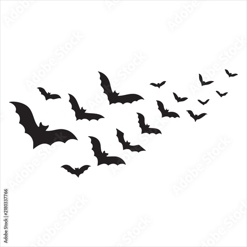 Black silhouettes of bats flying vector as a Halloween or spooky decoration