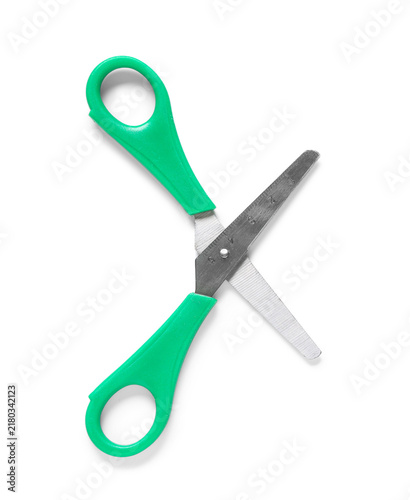 Obraz na płótnie Creativity and education, children safety scissors with green plastic handles an