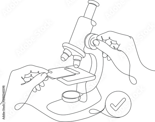 Hands using a microscope to examine a sample, representing laboratory research, science, testing, analysis and scientific discovery