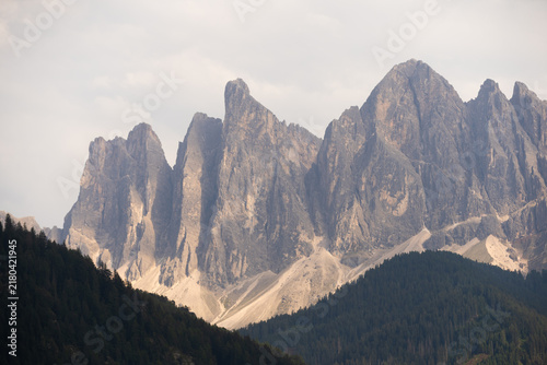 Konstfotografi Majestic scenery of rough mountain ridge near grassy hills