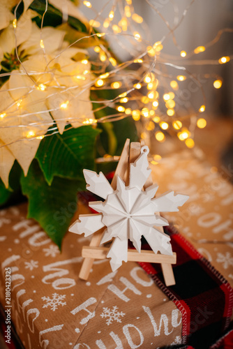 Christmas snowflake ornament with lights and gift box