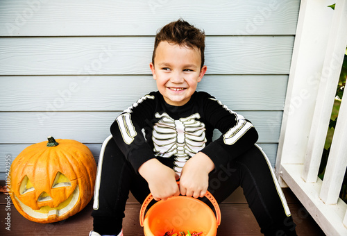 фотографія Little boy dressed up as a skelleton