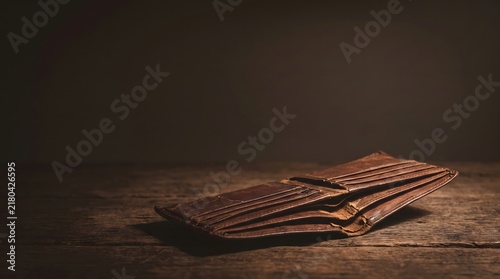 Empty worn wallet symbolizing financial anxiety and economic insecurity