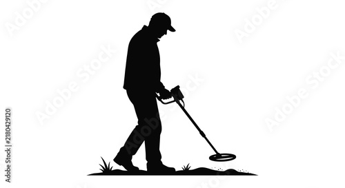 Картината върху платно Man using metal detector in field black silhouette