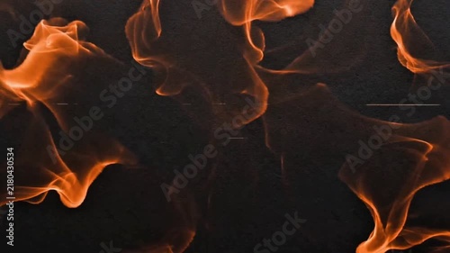 Burning fire flames border framing a dark textured background orange flame hot