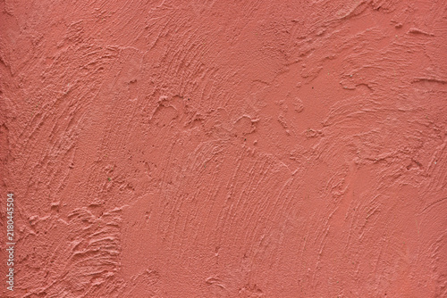 A beautiful abstract grunge-style plastered wall background featuring decorative patterns; an artistic banner image with a rough texture and space for text.