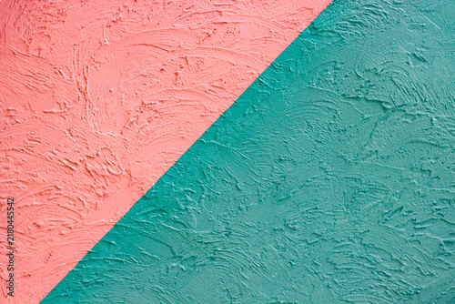 A beautiful abstract grunge-style plastered wall background featuring decorative patterns; an artistic banner image with a rough texture and space for text.