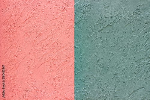 A beautiful abstract grunge-style plastered wall background featuring decorative patterns; an artistic banner image with a rough texture and space for text.