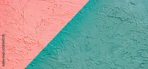 A beautiful abstract grunge-style plastered wall background featuring decorative patterns; an artistic banner image with a rough texture and space for text.
