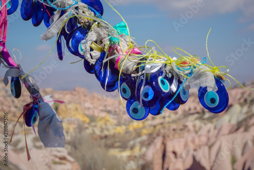 Cuadro en lienzo Traditional evil eye amulets hanging on tree branch in Cappadocia
