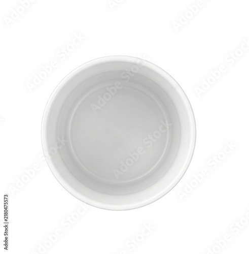 Obraz na płótnie Top view of a clean white ceramic ramekin dish on a white background