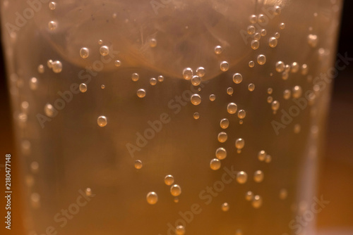 Принти на полотні Fizzy ginger ale beverage close up with bubbles