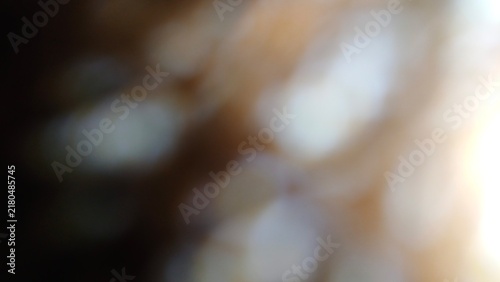 Cuadro en lienzo Abstract blurred background featuring soft golden and white bokeh lights created