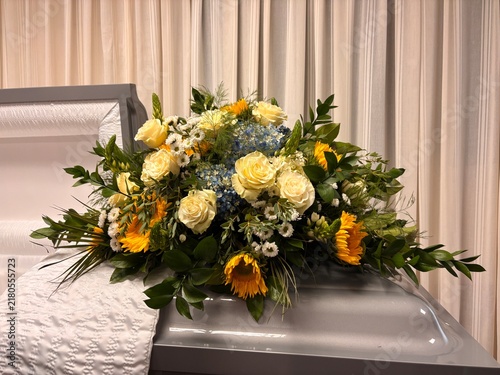 yellow sunflower funeral flower arrangement