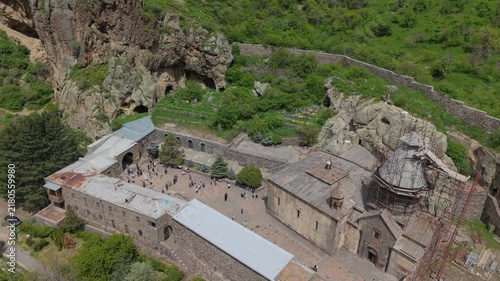 Aerial view complex of Geghard, Kotayk region, Armenia. Crosses in the rock, in the monastery of Geghard. Most touristic place in Armenia. The ancient Geghard Monastery in the mountains of Armenia.