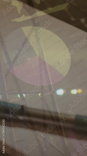 Animation of statistical data processing over pen and diary on a table against network towers