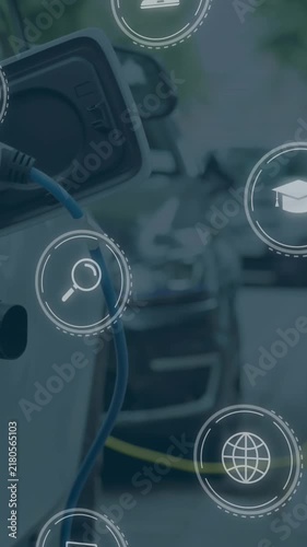 Animation of multiple digital icons against power cable pump plug in charging power to electric car