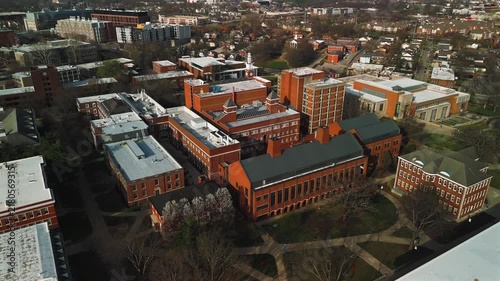Backward aerial pullout over historic University of Kentucky campus