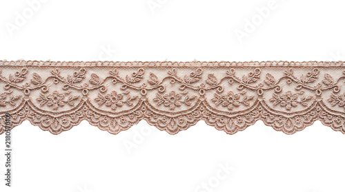Fotografie Detailed beige floral lace trim with scalloped edges showcasing intricate embroi