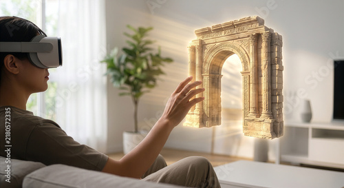 Obraz na płótnie VRヘッドセットを装着して自宅のリビングで古代遺跡の3Dホログラムを体験する人物。バーチャル観光や空間コンピューティング、歴史教育の未来を描くメタバースと複合現実のコンセプト