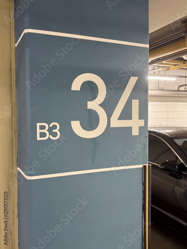 Number 34 Parking Space Sign Inside Urban Garage