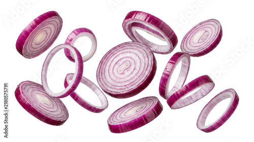 Vibrant sliced red onions floating in midair showing detailed organic vegetable rings and fresh purple textures on transparent background
