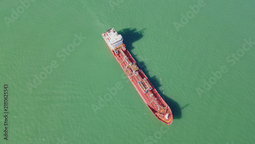 Fotografie Large cargo vessel navigating the Black Sea, showcasing a red hull and white sup