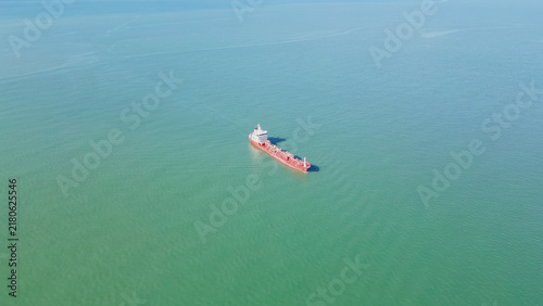 Konstfotografi Cargo vessel navigating the calm waters of the Black Sea, showcasing a red hull
