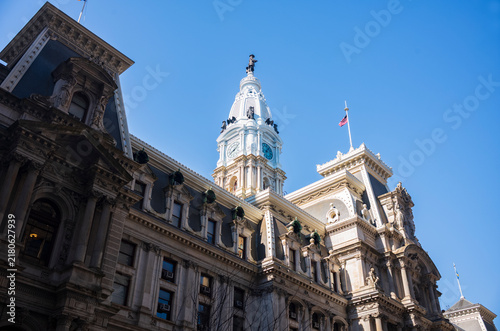 Upward view of the Philadelphia City Hall in Pennsylvania, photographed with clear skies in the background.