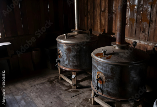 Obraz na płótnie Traditional maple syrup evaporators in rustic warehouse