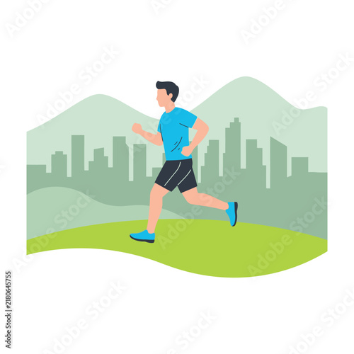 Man jogging in city park with mountains