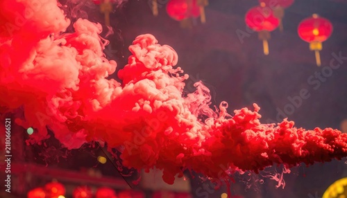 Abstract Red Smoke Clouds with Blurred Traditional Chinese Lanterns for Lunar New Year Celebration