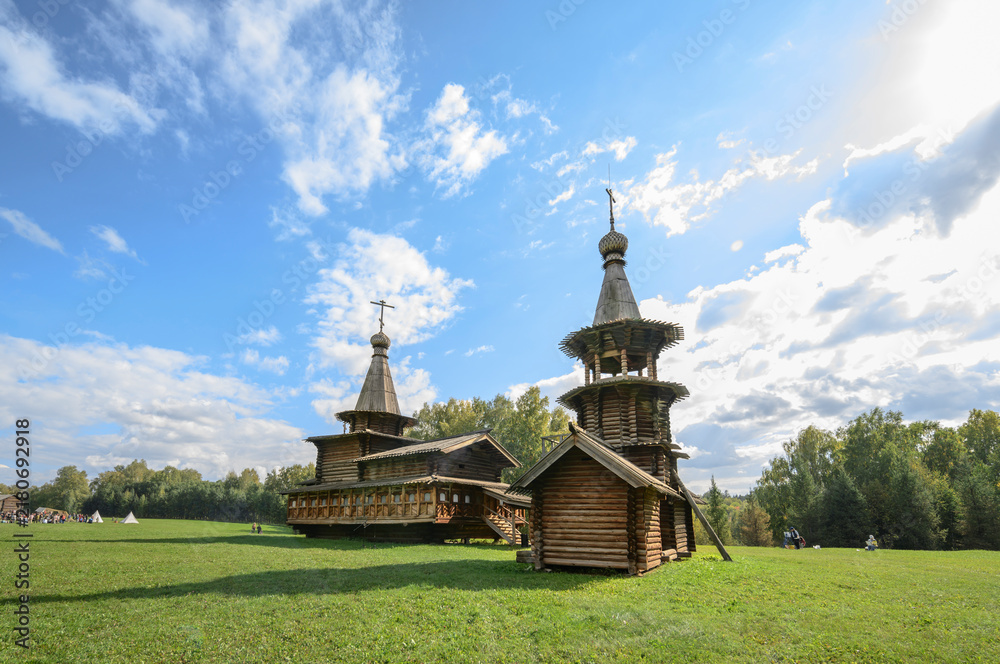 Fototapeta premium Bell Tower and Spaso-Zashiverskaya Church built of wood without a single nail in 1600 in Siberia, Russia
