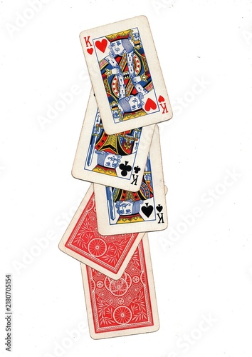 A hand of vintage playing cards isolated on a white background.