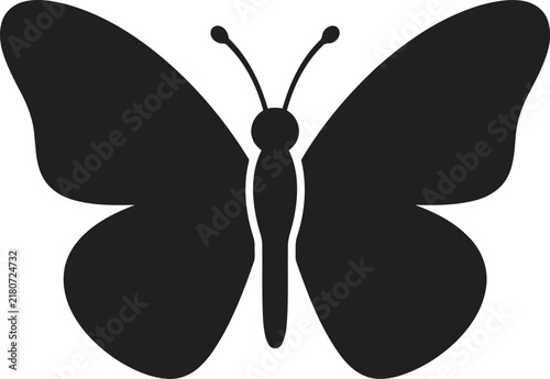 Black butterfly silhouette on white background