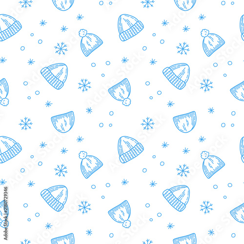 Blue hand drawn seamless winter pattern of knit beanies, pom-pom hats and snowflakes on white