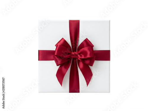 Square white gift box with a deep red satin ribbon bow tied on top