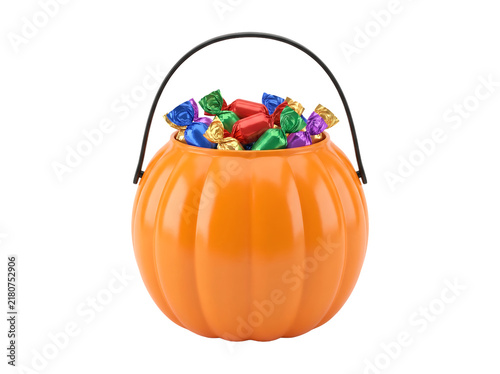 Orange pumpkin candy bucket filled with colorful sweets on transparent background