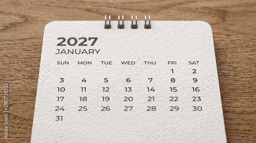 January 2027 desk calendar page standing on a wooden surface with wooden table calendar schedule planning business appointment organizer reminder chronology new year as transparent object
