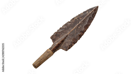 Fotografie Prehistoric stone arrowhead spear tip weapon artifact isolated primitive tool sp