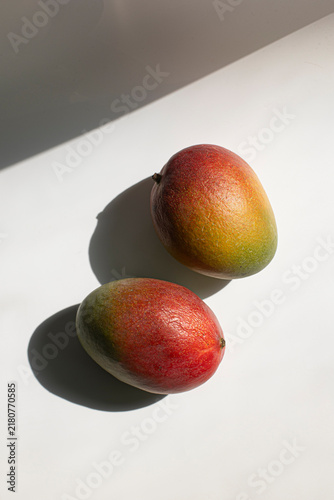 Obraz na płótnie Red mango fruit, isolated on white