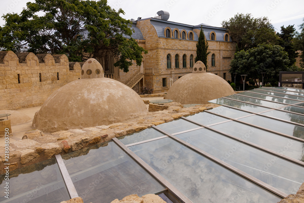 Obraz premium Unique architecture blends ancient domes with modern design in a serene historical site