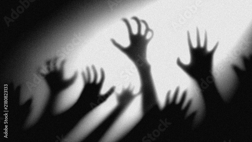 Scary dark silhouettes of reaching hands