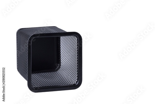 Empty black wire mesh square pen holder isolated on a white background