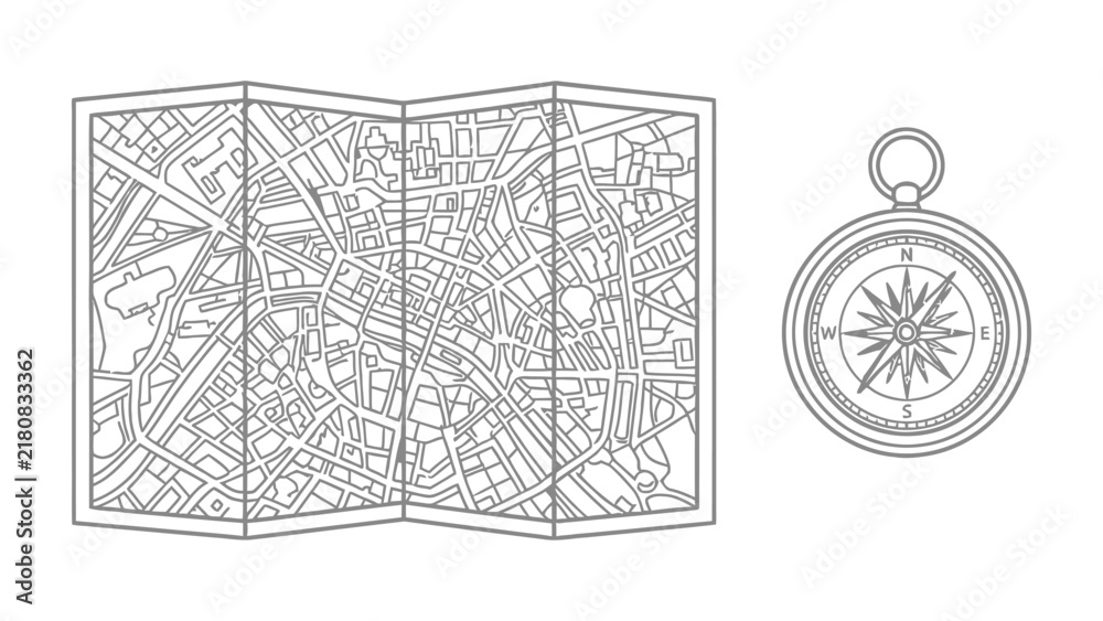 Fototapeta premium Navigational Tools: A meticulously detailed, folded map of an intricate city layout sits alongside a classic brass compass, symbolizing exploration and direction.