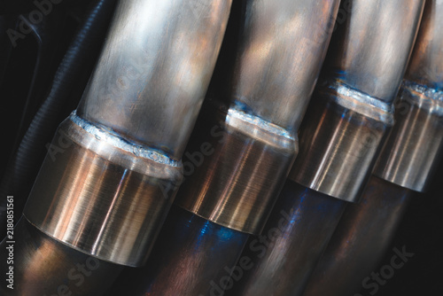 Photography Close-up of cylindrical metal tubes with welded joints