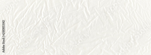 Cuadro en lienzo Wrinkled crumpled translucent paper texture joins compressed glossy folds to thi